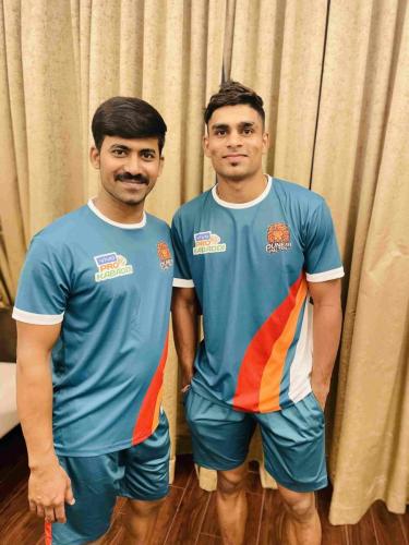 Puneri Paltan Masseur Madhusudan with player Rakesh